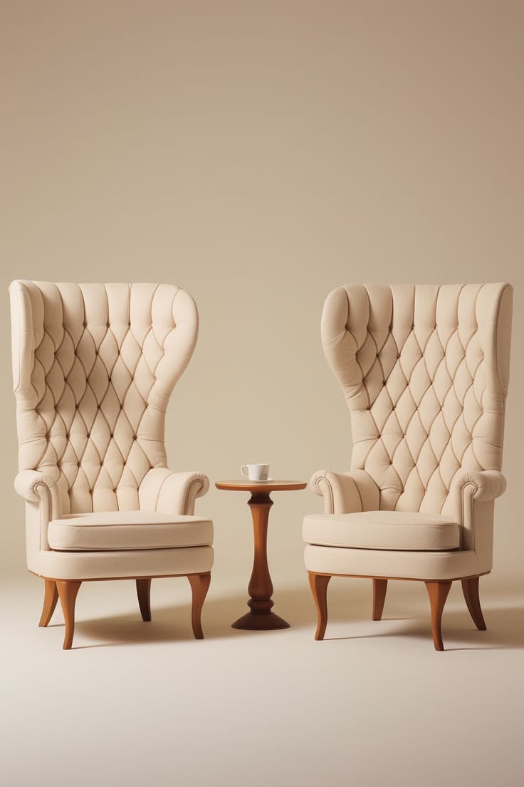 Ivory tufted wingback chair pair with wood legs