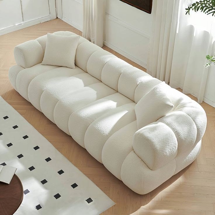 Cream tufted boucle cloud-style sofa